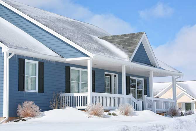 House in Winter Snow